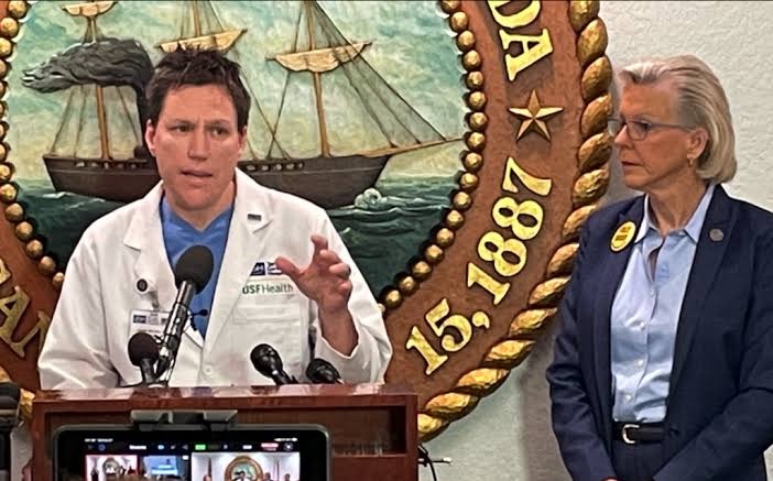 Jason W. Wilson speaking at a press conference